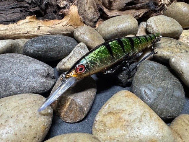 110+1 Green Sided Red Eye'd Black Foil Perch with Orange Belly Jerkbait